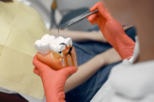 happy young woman in dentist chair
